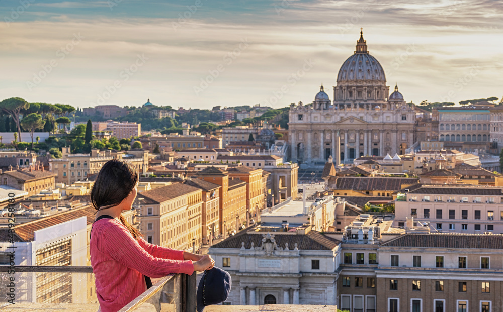 Rome Vatican Italy high angle view sunset city skyline with woman tourist