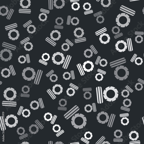 Grey Lying burning tires icon isolated seamless pattern on black background. Vector