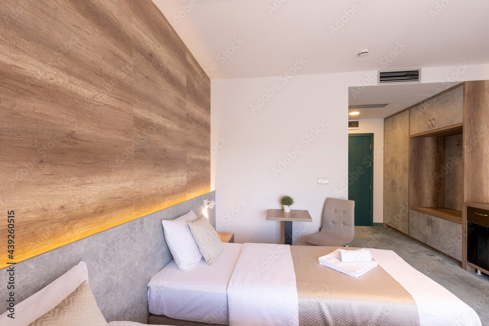 Fototapeta premium Interior of a hotel bedroom in luxury hotel