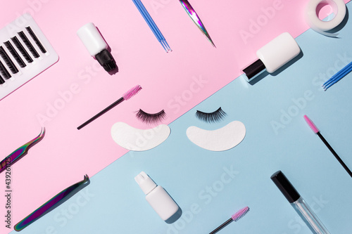 Artificial eyelashes, patches and tweezers, top view. The concept of the lashmaker, artificial eyelash extension.