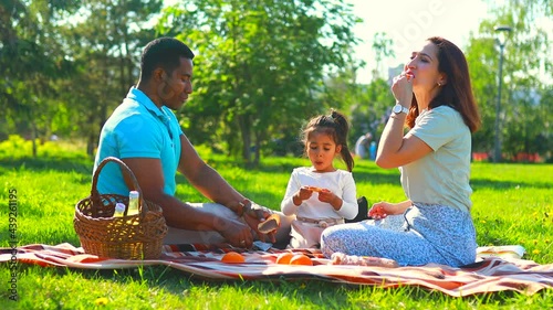 happy family spending time together in sunset summer park