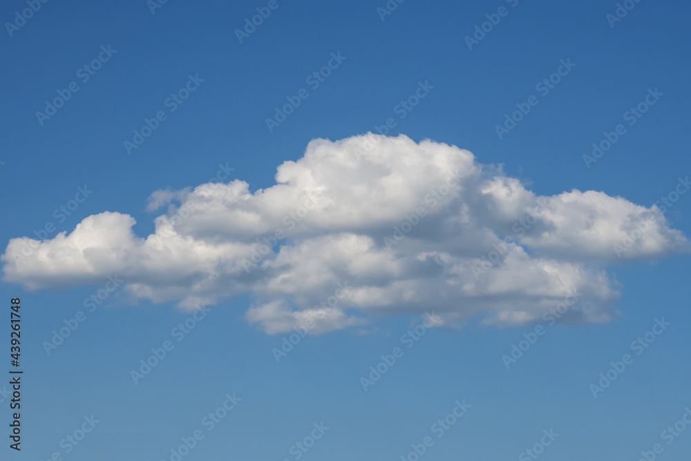 One white textured lonely cloud. Nature.