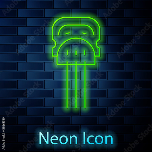 Glowing neon line Flamenco woman accessories icon isolated on brick wall background. Peineta. Spanish comb. Vector