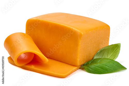 Piece of Cheddar cheese, isolated on white background. High resolution image photo
