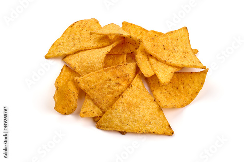 Tortilla chips, Mexican nachos, isolated on white background. High resolution image.