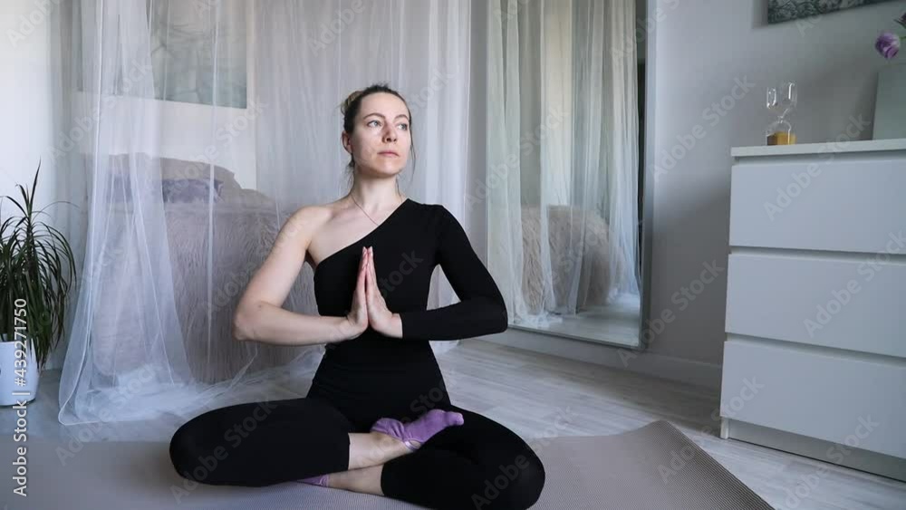 A young white-skinned girl of European appearance does yoga at home. A young white-skinned girl of European appearance does gymnastics at home. A young white-skinned girl of European appearance is eng A young white-skinned girl of European appearance does yoga at home. A young white-skinned girl of European appearance does gymnastics at home. A young white-skinned girl of European appearance is eng