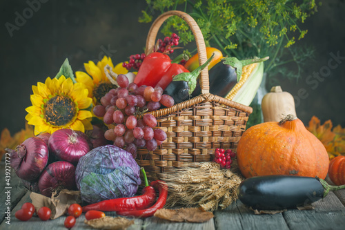 The table, decorated with vegetables and fruits. Harvest Festival,Happy Thanksgiving. Autumn background. Selective focus. photo