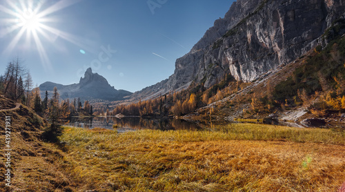 Stunning Autumn scenery, Great View on mountain valley with Calm highland lake. Amazing nature mountain landscape. popular touristic attraction. Best famouse travel locations. Scenic Image of Italy. © jenyateua