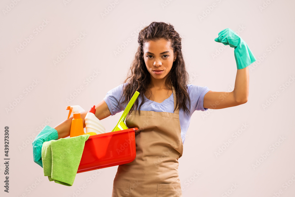 Portrait of african-american housewife who is ready for housework. Portrait of african-american housewife who is ready for housework.