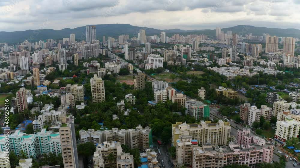 Aerial view of apartment houses in the neighborhoods of North Mumbai - circling, drone shot Aerial view of apartment houses in the neighborhoods of North Mumbai - circling, drone shot