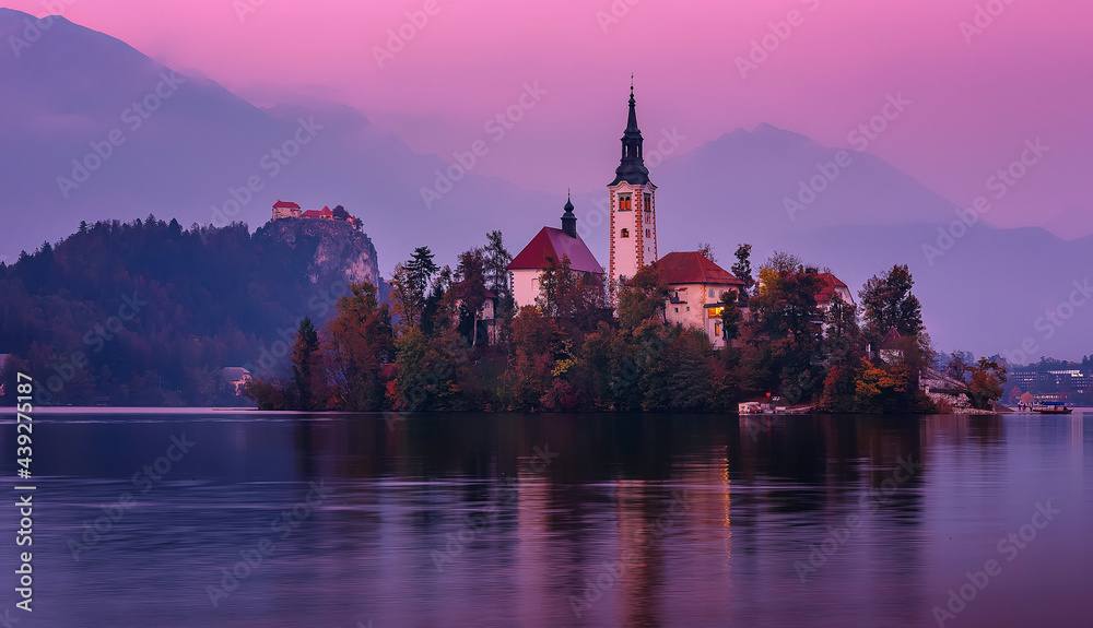 Scenic image of fantastic sunset over Bled lake. Slovenia. Incredible nature landscape.