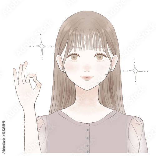OKサインを出す女性