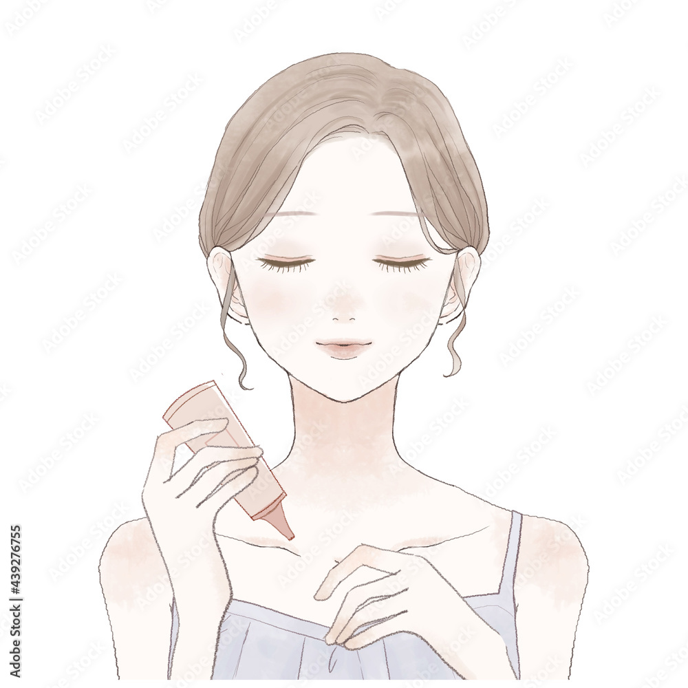 ハンドクリームを塗る女性