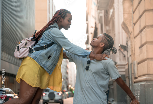 A traveling couple having fun in the city