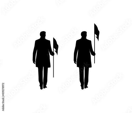 silhouette of the man bringing a flag
