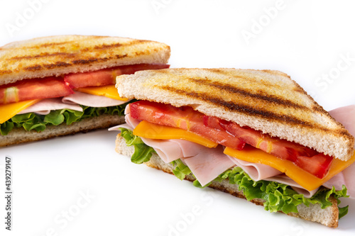 Sandwich with tomato,lettuce,ham and cheese isolated on white background