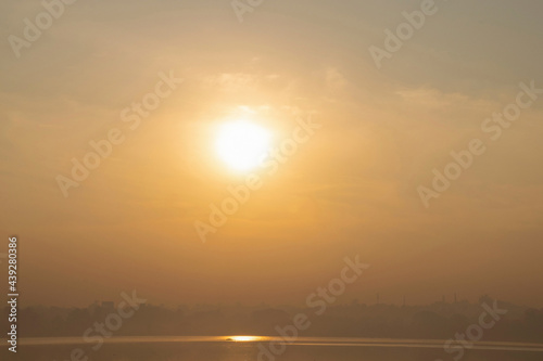 Photography Stock photo of Beautiful calm and golden sunset scene, sunlight reflected in lake water