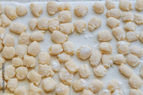 dough close-up on a plastic board sprinkled with flour