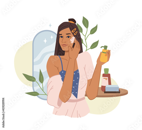 Young woman use essential cosmetics, natural cream or oil, cleans face skin flat cartoon vector illustration. Female apply anti aging korean cream, moisturize head. Table, plants, mirror on background