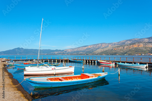 Greece Aitoliko, traditional fishing boats port in sea lake in Central Greece photo