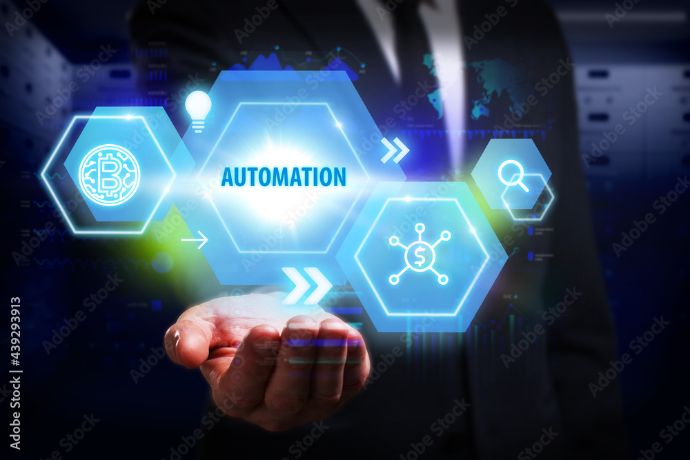 Business, Technology, Internet and network concept. Young businessman working on a virtual screen of the future and sees the inscription: Automation