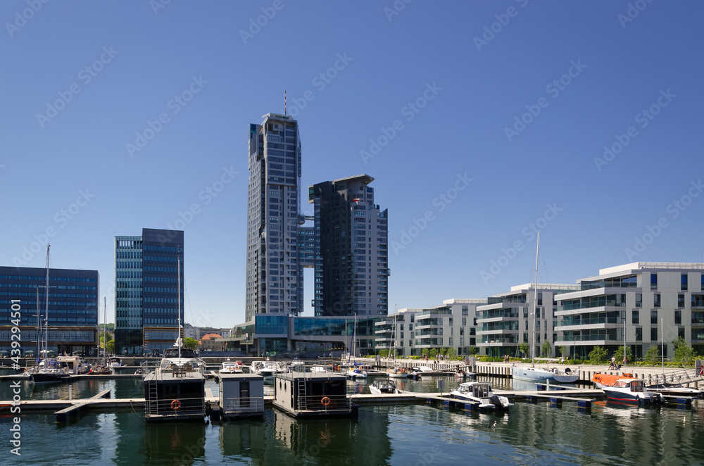 Fototapeta premium CITYSCAPE - A marina and a prestigious district of a dynamic and modern seaside city 