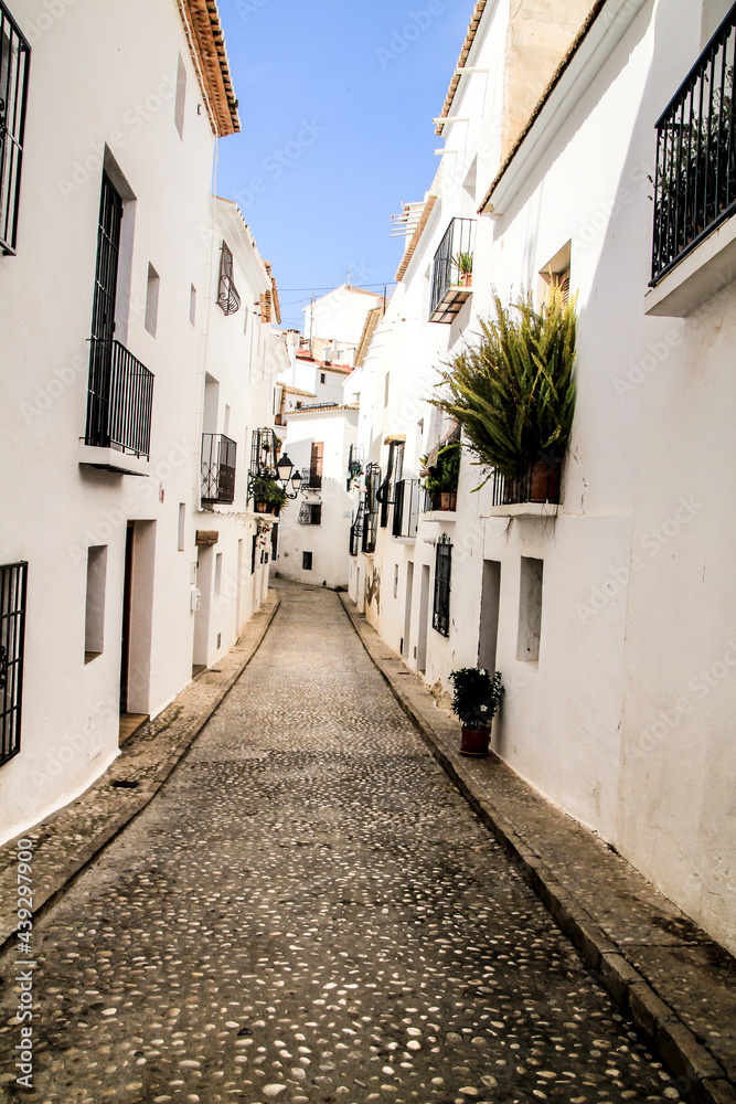 Narrow streets and whitewashed facades in Altea village