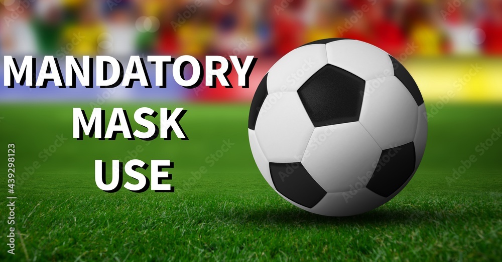 Obraz premium Composition of mandatory mask use text and football over sports stadium