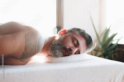 Man relaxing with a spa treatment