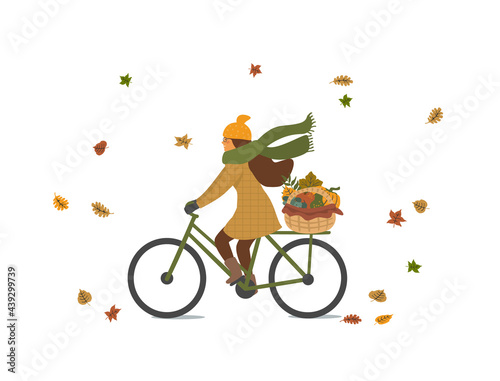 girl riding bike in the autumn fall park scene
