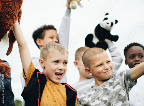 Group of young boys caring about animal rights