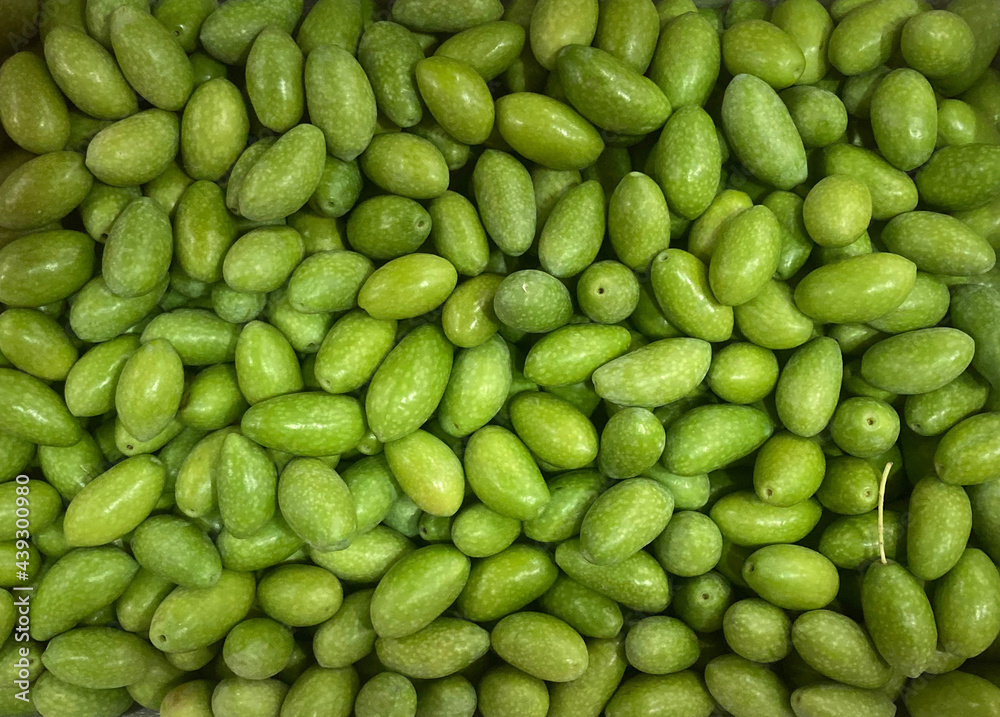 Background of fresh green olives Background of fresh green olives