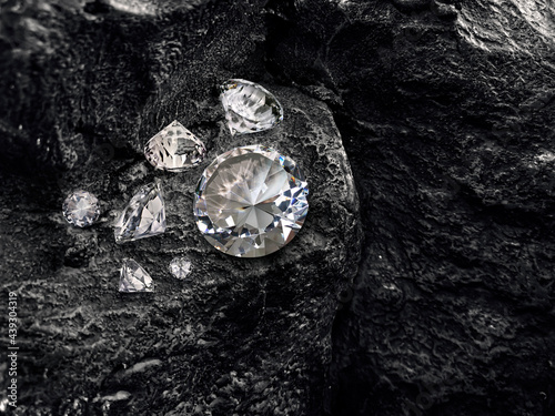 Group diamond on black coal background