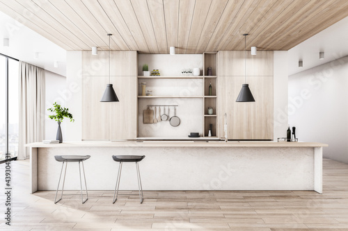 Modern wood and concrete kitchen interior with island, appliances and window with city view and daylight. 3D Rendering.