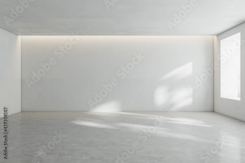 Fototapeta Naklejka Na Ścianę i Meble -  Sunny spacious hall room with blank wall, light glossy concrete floor and window. 3D rendering, mock up