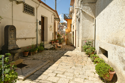 Ruvo del Monte  Italy  June 12  2021. A narrow street among the old houses of a medieval village in the Basilicata region.