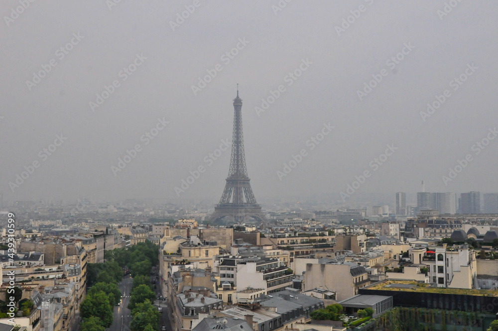 Paris cityscapes from above in the fog