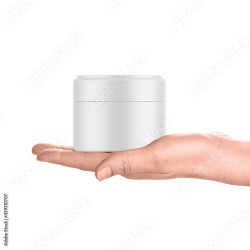 Cosmetic cream jar in female hand, mockup template on isolated white background, skin care product package, 3d illustration