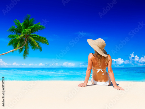 Woman relaxing on the beach.