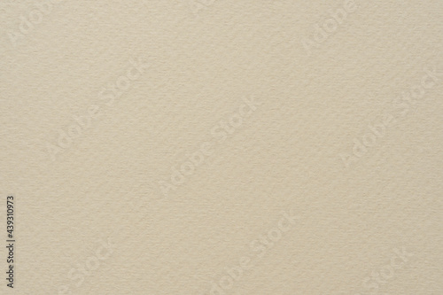 Beige paper texture. Paper sheet for painting and drawing close up.