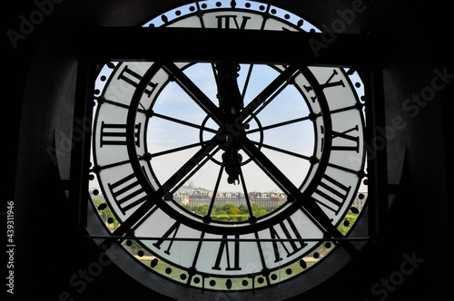 View on the city through the clock mechanism