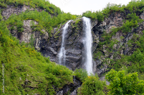 Polikarya Waterfall  located on the slope of Mount Aibga  in Krasnaya Polyana  Sochi. The height of the waterfall is 70 meters