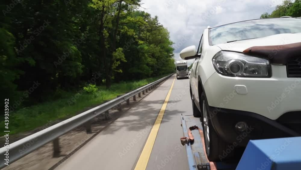car is transported on tow truck.transporting cars after accidents and breakdowns car is transported on tow truck.transporting cars after accidents and breakdowns
