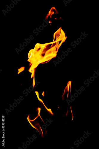 Real flames from underground gas isolated on black © photografiero