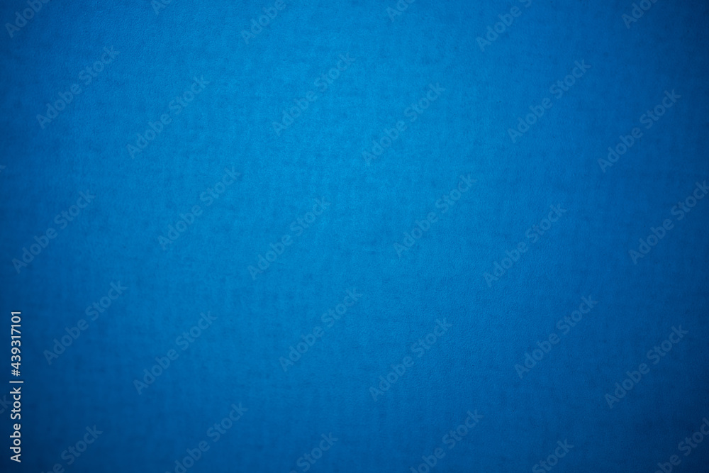 Blue blank textured background of rough plastic material