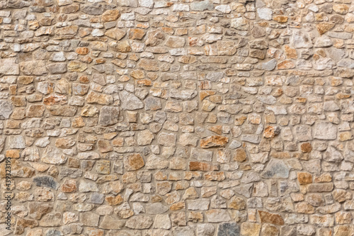 Architecture textures, detailed and rustic of paired masonry granite, traditional spanish granite wall