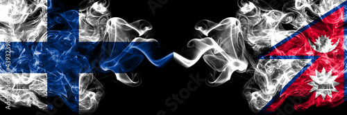 Finland  Finnish vs Nepal  Nepali  Nepalese smoky flags side by side.