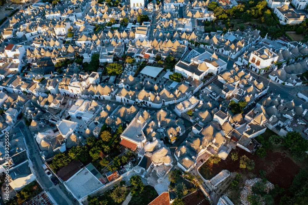Aerial view of alberobello at sunset, the city of trulli in Puglia. a magical city and a beautiful landscape