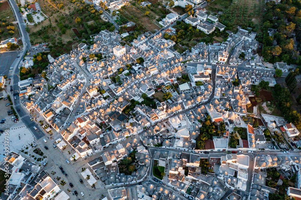 Aerial view of alberobello at sunset, the city of trulli in Puglia. a magical city and a beautiful landscape
