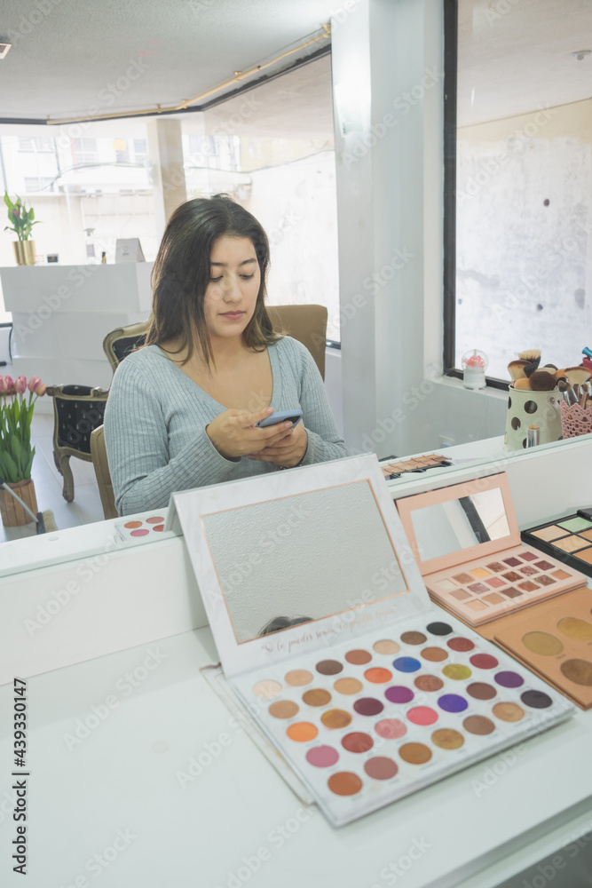 Young woman getting ready to put on makeup for a special event. Young woman getting ready to put on makeup for a special event.